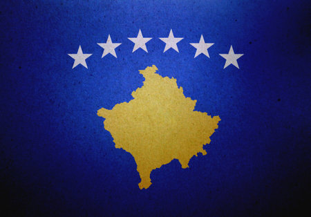 Flag of Kosovo printed on a paper sheet.の写真素材