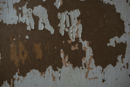 Old wooden rustic door texture in beautiful studio, close up of peeling paintの写真素材