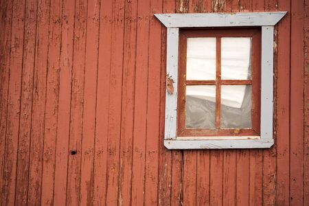 A window on a rustic mountain cabin in Cripple Creek, Coloradoの写真素材