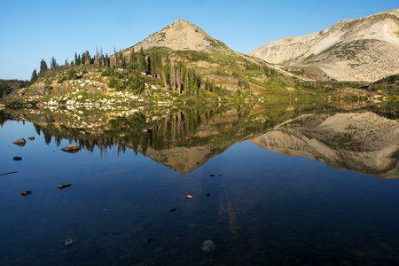 Sugarloaf Mountain and Medicine Bow Peak reflected in Libby Lake  in Medicine Bow National Forest in Wyoming.の写真素材