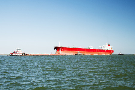 Oil Tanker, Cargo Ship and 2 Tug Boats near Corpus Christi, Texasの写真素材