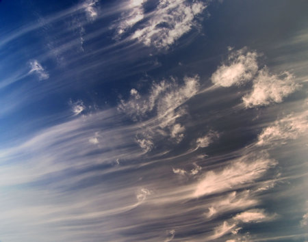 Photo of clouds streaking across the sky