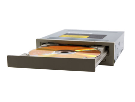 Photo of a dvd drive with the focus on the tray and disc, isolated on whiteの写真素材