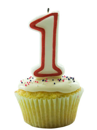Cupcake with a number one candle on it for birthday, anniversary or otherの写真素材
