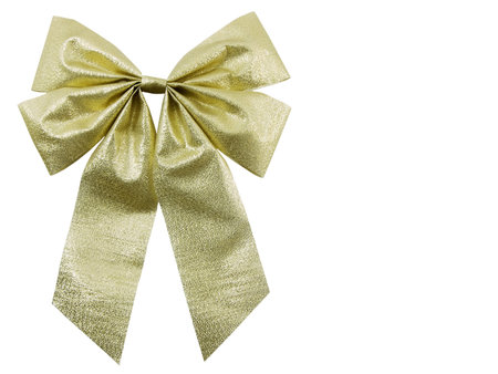 Gold christmas bow isolated on a white backgroundの写真素材
