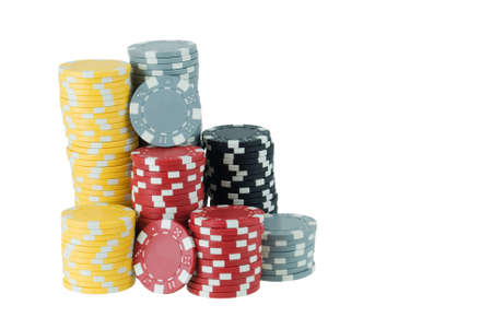 Stacks of several poker chips isolated on whiteの写真素材