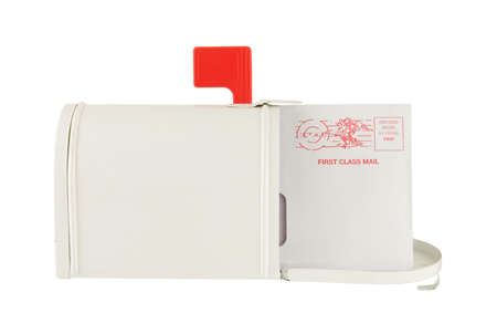 Envelope in a mailbox isolated on whiteの写真素材