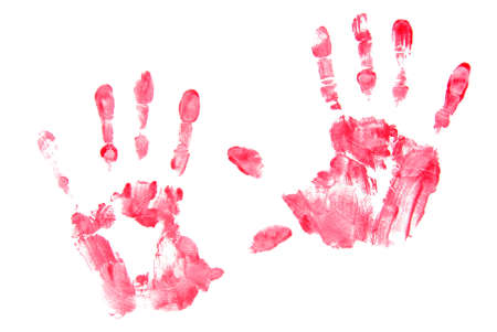 Left and right hand prints made with red paint on white backgroundの写真素材