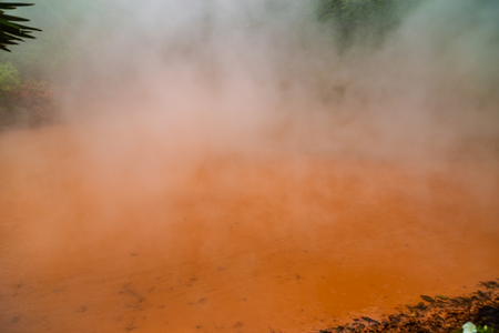 Red steaming boiling pool.の写真素材
