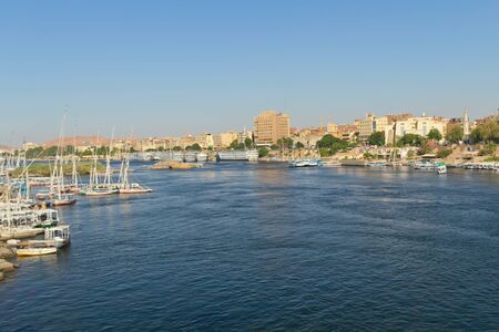Boats and floating hotels in the port city of Aswan, the gateway to Nubia  Egypt の写真素材