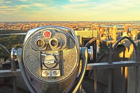 Coin operated binoculars in sunset light  Top of the Rock, New York City  の写真素材