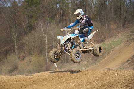 MOHELNICE,  CZECH REPUBLIC - APR 2013: Undefinied racer on quad motorbike in the "Crossracing Cup 2013"  in April 21, 2013, MOHELNICE, Czech Republic. のeditorial素材