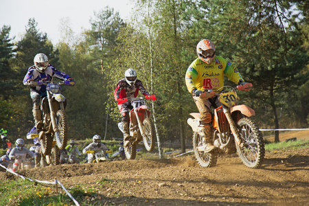 ZABREH, CZECH REPUBLIC - OCT 19.Motocross riders are jumping at Motocross Zabreh Cup on October 19, 2013 in Zabreh, Czech Republic (Central Europe)のeditorial素材