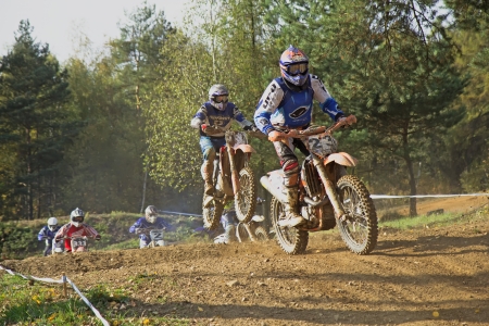 ZABREH, CZECH REPUBLIC - OCT 19.Motocross riders after start at Motocross Zabreh Cup on October 19, 2013 in Zabreh, Czech Republic (Central Europe)のeditorial素材