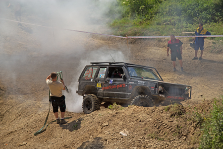 MOHELNICE,  CZECH REPUBLIC - JUNE 07: Recovering of a off road car  in the "Championship of the Czech Republic in the off road tech trial-2014" on June 07, 2014  in MOHELNICE, Czech Republic. のeditorial素材
