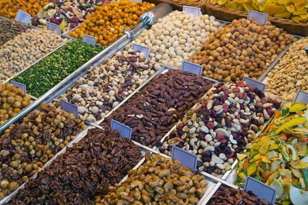 Different kinds of nuts ready for sale at the farmers market.の写真素材