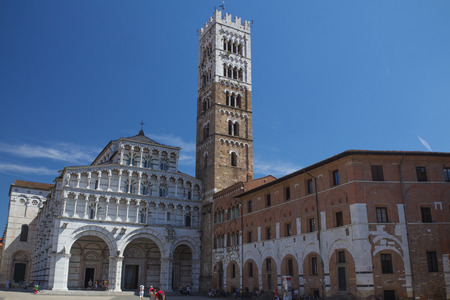 LUCCA - AUG 29: The square of St Martin is characterized by various traits inherited from the city's past - like that of a typical urbanistic layout of a Roman settlement. August 29, 2014 in Luccaのeditorial素材