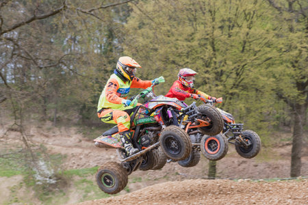 MOHELNICE, CZECH REPUBLIC - APRIL 23. Pair of quad riders are jumping  in the Crossracing cup 2016-...