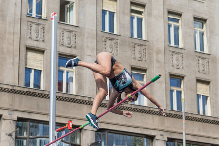 PRAGUE,  CZECH REPUBLIC - JUNE 22: Athlete dropped the lath on Wenceslas Square in Pole Vault of...