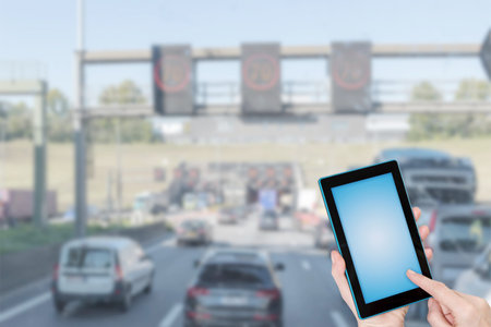 Traffic jam infographic concept. Finger touching tablet blank screen ready for your text....