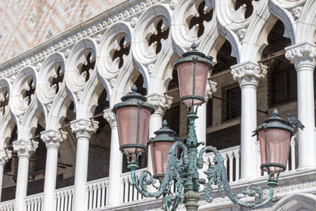 Old street lamp in Venice against the Doge's Palace in the background. Venice. Italy. Horizontally.のeditorial素材