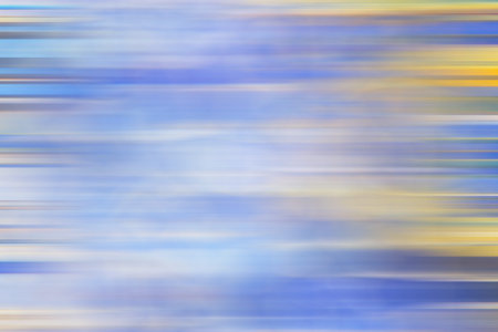 Abstract of blurred blue yellow background can be used as your wallpaper, poster, card, invitations, wesite, banner design etc.の写真素材
