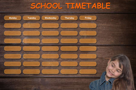 School planner concept on countryside, farm theme. Little tanned girl is smiling on timetable.の写真素材