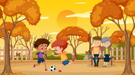 Park at sunset time scene with children playing football illustrationの写真素材