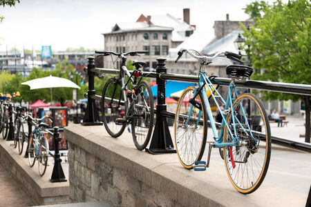 Bicycles locked in urban settingのeditorial素材