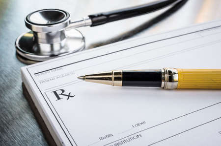 a prescription form and stethoscopeの写真素材