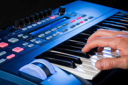 person playing a keyboard