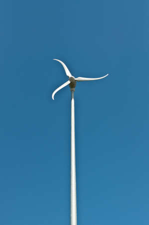 Spinning Windmill with Blue Skyの写真素材