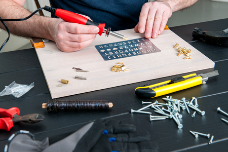 Stock picture of pyrography pen , tools and creative hobby workの写真素材