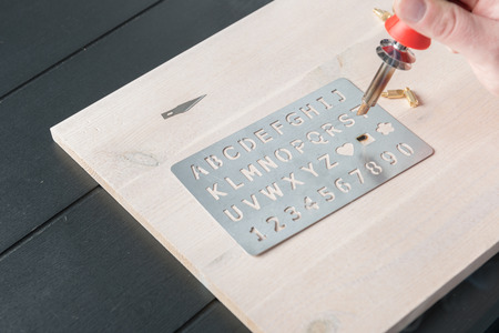 Stock picture of pyrography pen and creative hobby workの写真素材