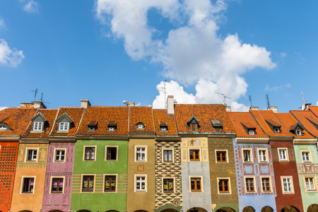 Poznan, Poland. July 11, 2021. Very colourful houses in the old market square in Poznan, Poland. The city center dates back to the 1200s. The houses are very old and charming, with vivid colours and different kinds of patterns painted on top of the colourのeditorial素材