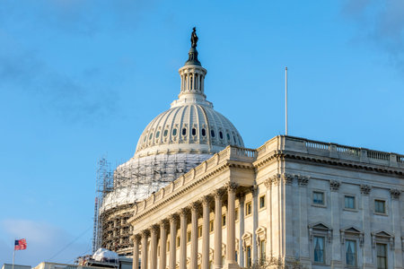 The U.S. Capitol Building with reduced scaffolding as a part of the Dome Restoration Project. The dome scaffolding has been partially dismantled.のeditorial素材