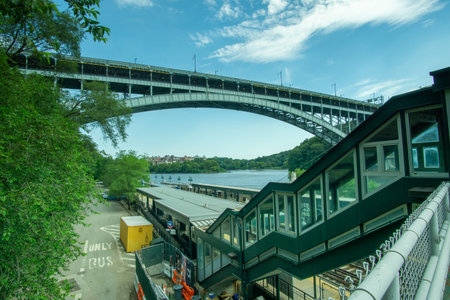 Bronx, NY / USA - 8/1/2020: A landscape view of the MetroNorth Spuyten Duyvil Train Station and the...