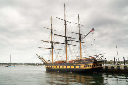 Newport, RI, / United States - 9/17/2020: a landscape view of SSV Oliver Hazard Perry, a three-masted square-rigged vessel, taken on an overcast day.のeditorial素材