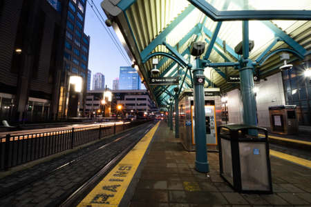 Jersey City, NJ - USA - Feb. 27, 2021: Horizontal evening view of the Exchange Place station on the HudsonâBergen Light Rail in Jersey City.のeditorial素材