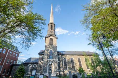 Kingston, NY - USA- May 12, 2021: The Old Dutch Church, a 19th-century bluestone church and cemetery located on Wall Street in the Kingston Stockade District.のeditorial素材