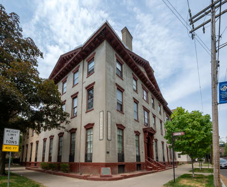 Schenectady, NY - USA - May 22, 2021: a three quarter view of the historic Stockade Inn, located in the Stockade Historic Districtのeditorial素材