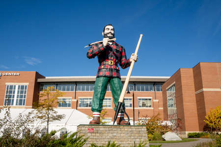 Bangor, ME - USA - Oct. 12, 2021: Landscape view of the 31-foot-tall Paul Bunyan statue. It was built by New York-based builders Messmoor and Damon. It was designed by local artist J. Normand Martin.のeditorial素材