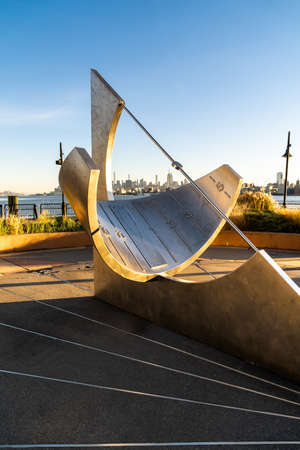Jersey City, NJ - USA - Nov. 14, 2021: Horizontal view of the Harborside/Hyatt Jersey City Sundial, a large public sundial at the end of a popular pier on the Hudson River. Created by Robert Adzema.のeditorial素材