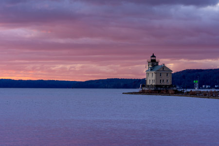Kingston, NY - USA -Nov. 27, 2021: Horizontal sunrise view of the historic Rondout Light, a lighthouse on the west side of the Hudson River at Kingston, New York.のeditorial素材
