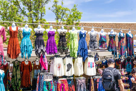 Suffern, NY - USA - May 1, 2022: landscape view of people enjoying the street vendors, music and food of the annual Suffern Spring Street Fair,  held in the downtown shopping district of Suffern.のeditorial素材