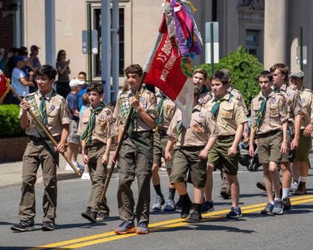 Suffern, NY - USA - May 30, 2022 Boys Scouts from Troop 21, chartered to the All Souls Community Church in Suffern, march the Annual Memorial Day Parade and Ceremony.のeditorial素材