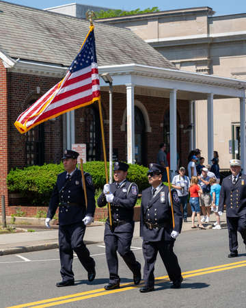 Suffern, NY - USA - May 30, 2022 Honor Guard from the Suffern Fire Department march in the Annual Memorial Day Parade and Ceremony.のeditorial素材