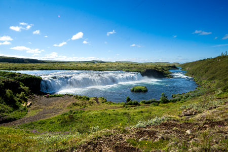 SkÃ¡holt, Iceland - July 2, 2022 A wide angle view of the Faxi or Vatnsleysufoss waterfall, located on the Golden Circle.The waterfall is on the TungufljÃ³t river.のeditorial素材