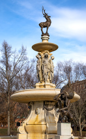 Hartford, CT - USA - Dec 28, 2022 The two-tiered Corning Fountain, a bronze and granite fountain with stylized Saukiog and Oneida Indians and a stag located in Bushnell Park located in  Hartford.のeditorial素材