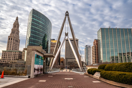 Hartford, CT - USA - Dec 28, 2022 Horizontal view of the iconic Phoenix Gateway Bridge, a modern architectural marvel. built for pedestrians only to facilitate foot-traffic to the Riverfront Plaza.のeditorial素材